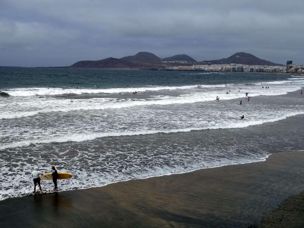 Las Palmas beach with surfers